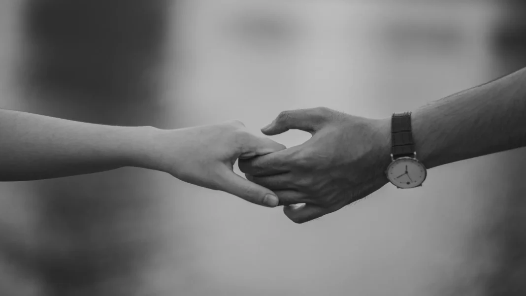 image of hands of people in love with each other showing symbol of love